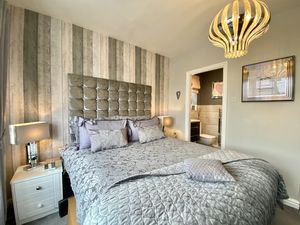 Bedroom One- click for photo gallery